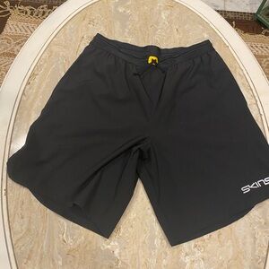 Men’s medium Skins shorts